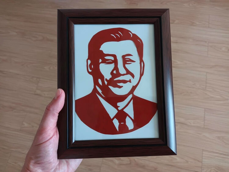 Xi Jinping paper cutting in picture frame