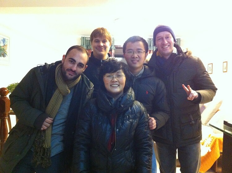 Group of foreign travelers with Chinese people