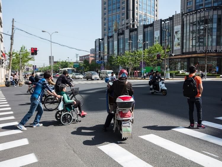 Walking across a pedestrian crossing in China