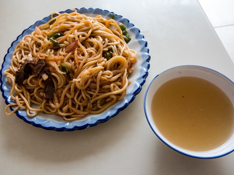 Noodles and bowl of soup