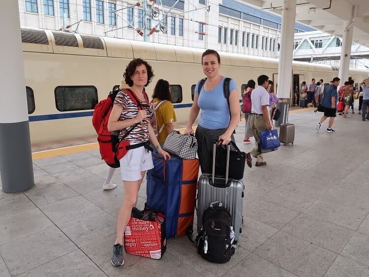 Foreign women with luggage in China