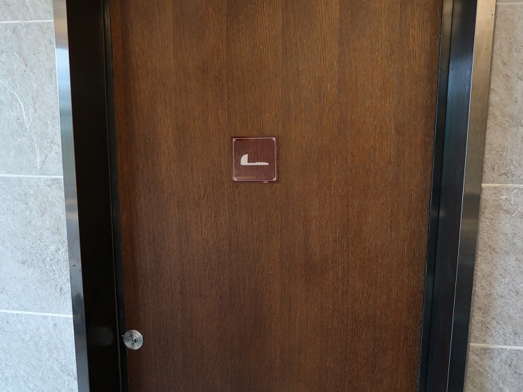 door with chinese squat toilet symbol