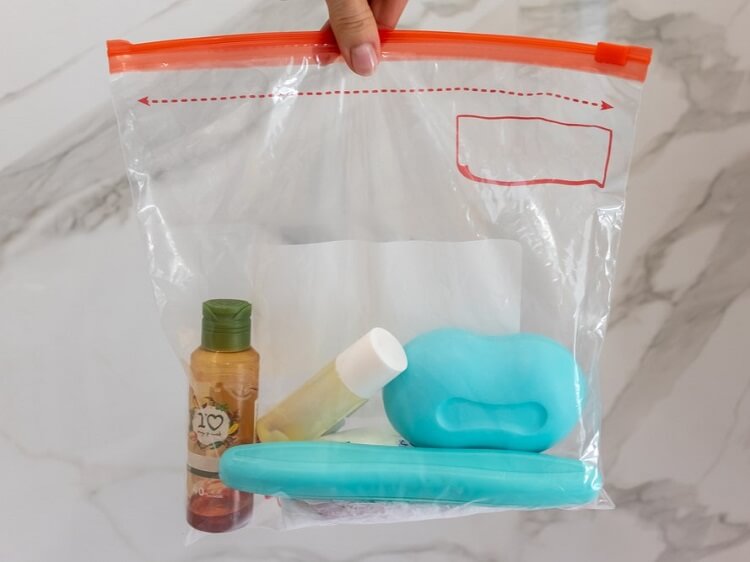 shampoo soap toothbrush in zip lock bag
