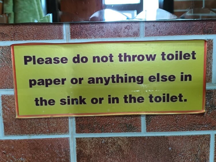 Toilet paper sign