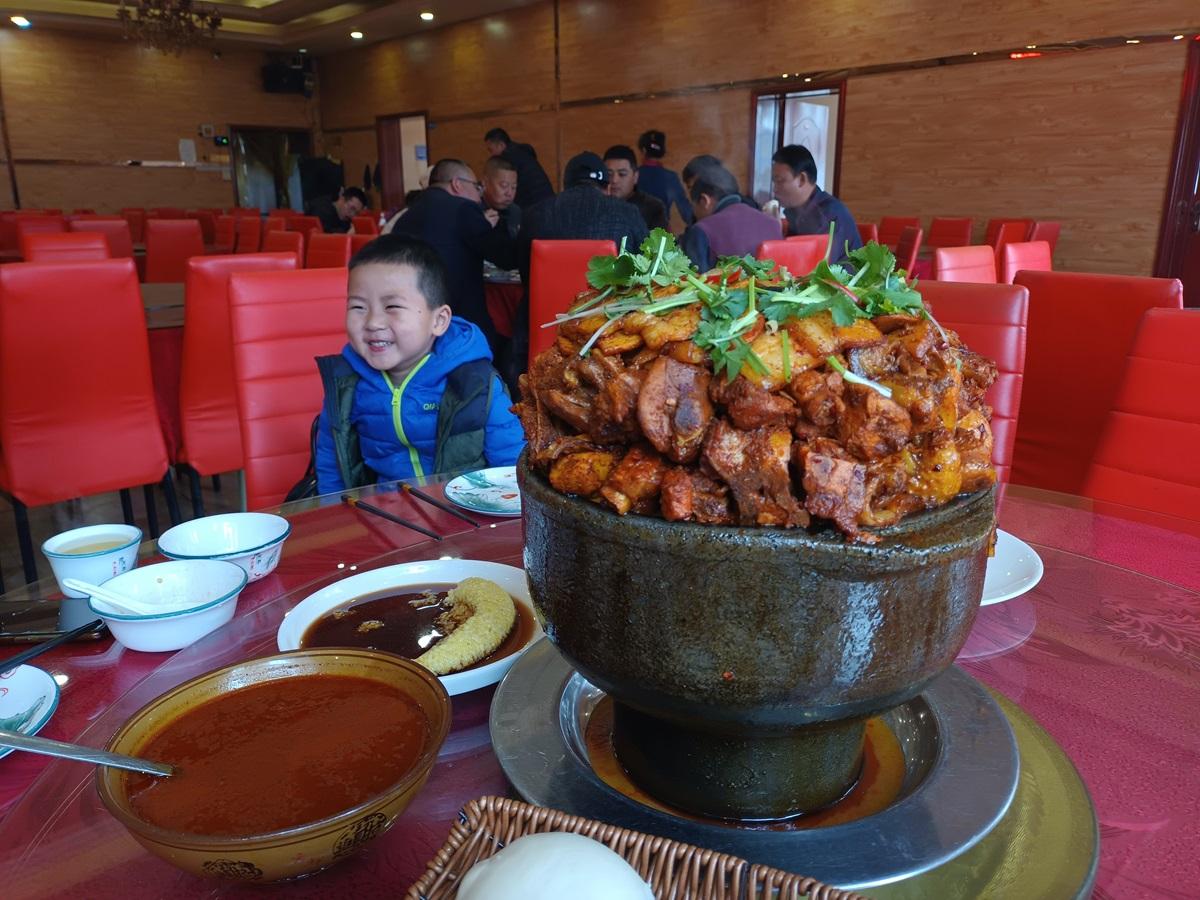 meat in large pot in a restaurant in China