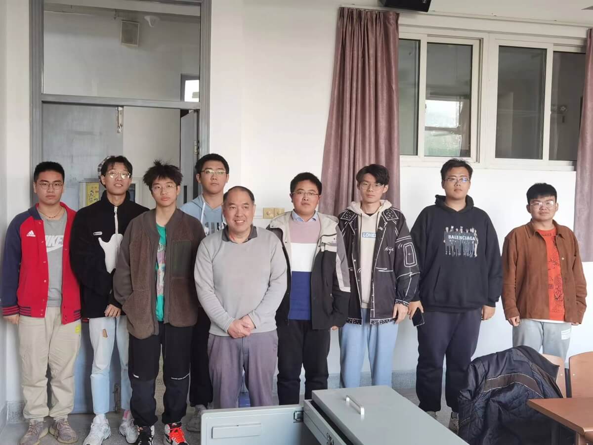 Chinese university students with English teacher