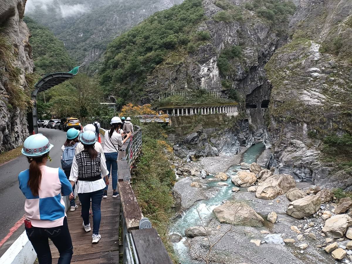 tourists wearing hard hats at Toroko Gorge